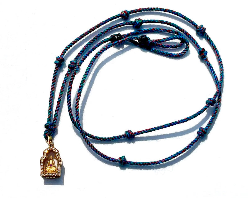 The Jewel in the Lotus necklace, Buddha