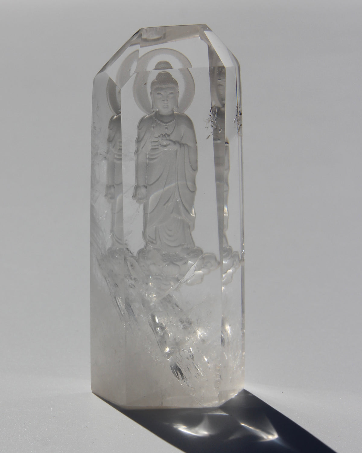 Intaglio carving of the Lord Buddha, with a Lotus on the heart on an Himalayan crystal.  Himalayan crystal are a pure symbol of the Light and many anchor magnificent codes on Gaïa, 